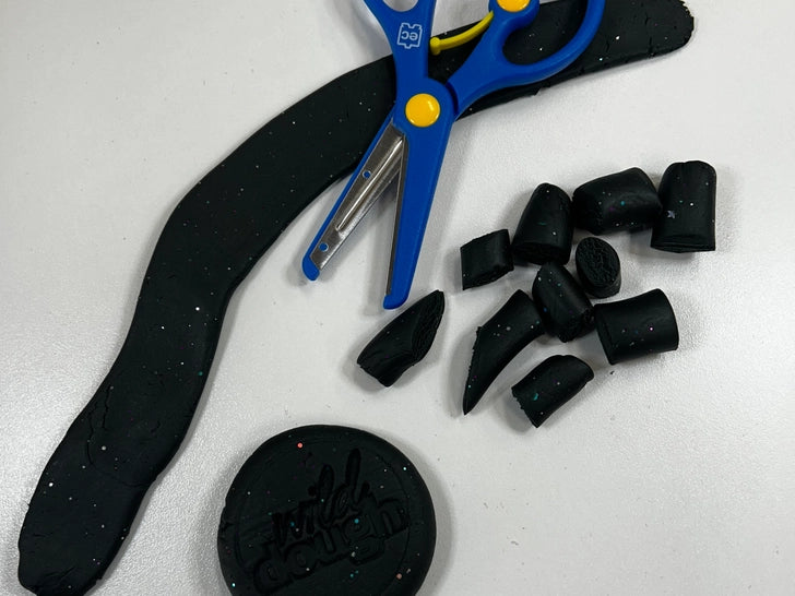 Galaxy black playdough twinkling with glitter